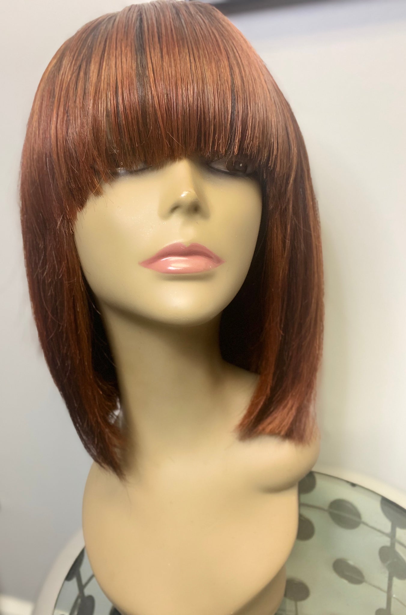 bob wig, colored wig, cinnamon hair color, auburn wig, tallahassee wig store, tallahassee beauty supply, wig head, 